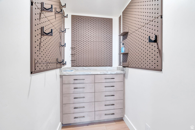 3918 South Mapleton Ests Drive Mapleton, UT 84664 - Photo 68 of 103 Half bath featuring vanity and light wood-style flooring