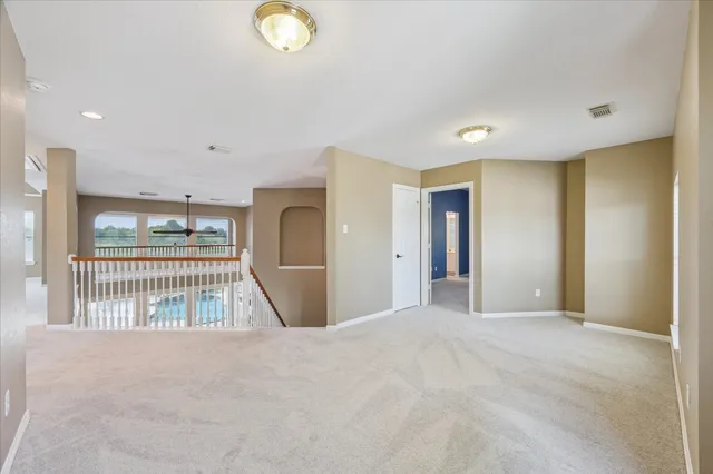 a view of an empty room and window