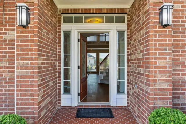 a view of a brick house with a door