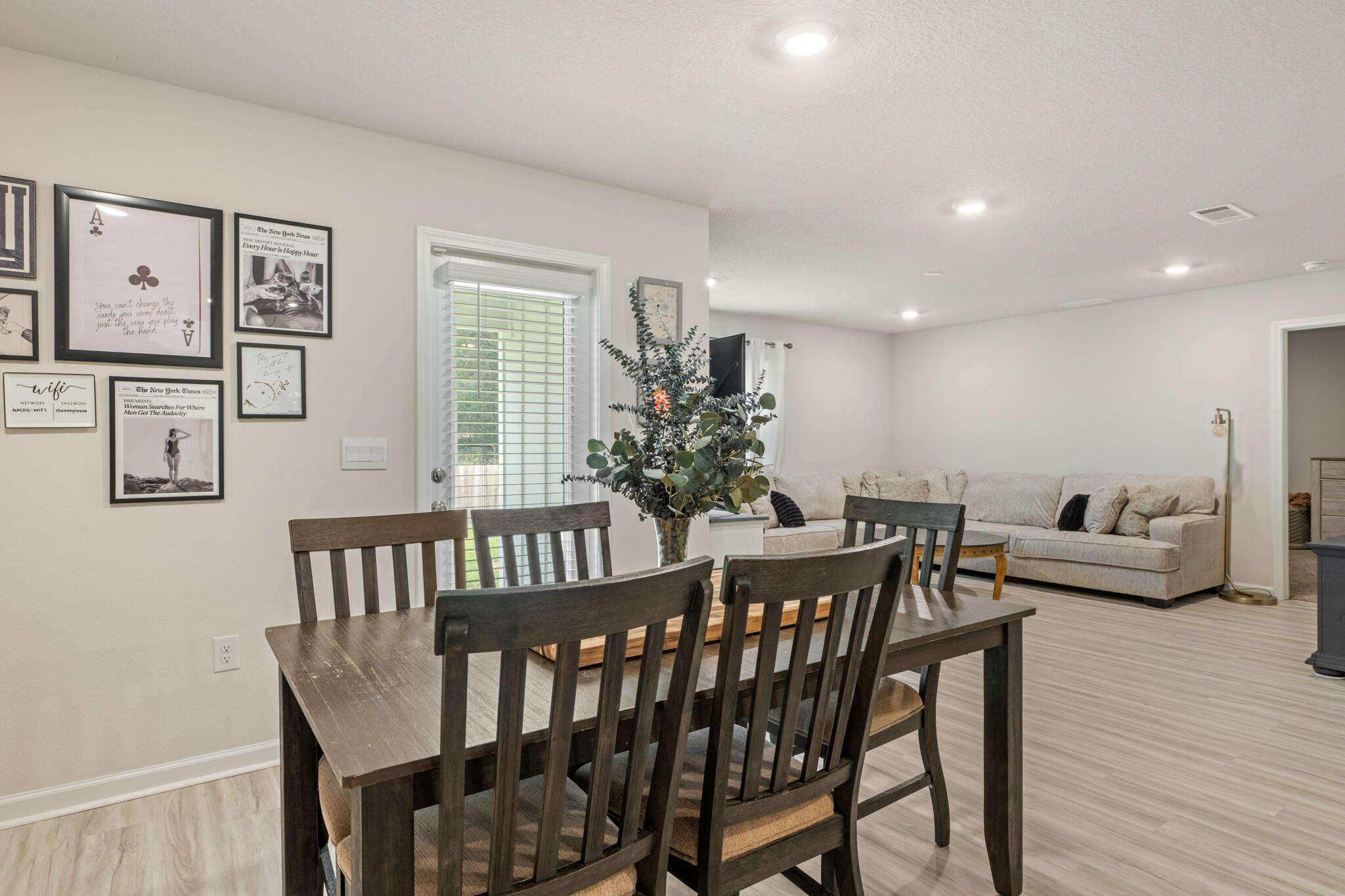 810 Otto Loop Crestview, FL 32539 - Photo 19 of 41 a view of a dining room with furniture window and wooden floor