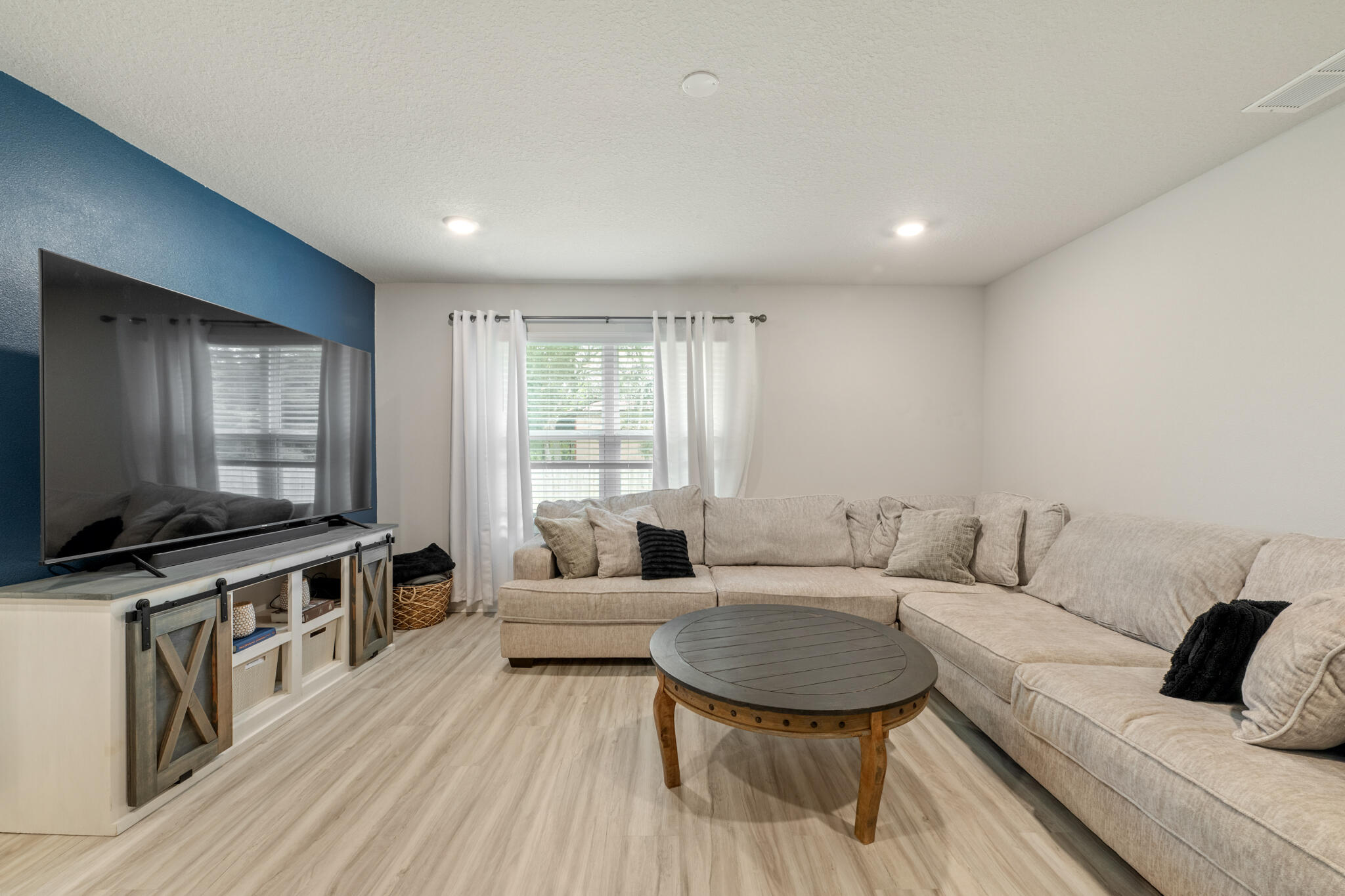 810 Otto Loop Crestview, FL 32539 - Photo 22 of 41 a living room with furniture and a flat screen tv