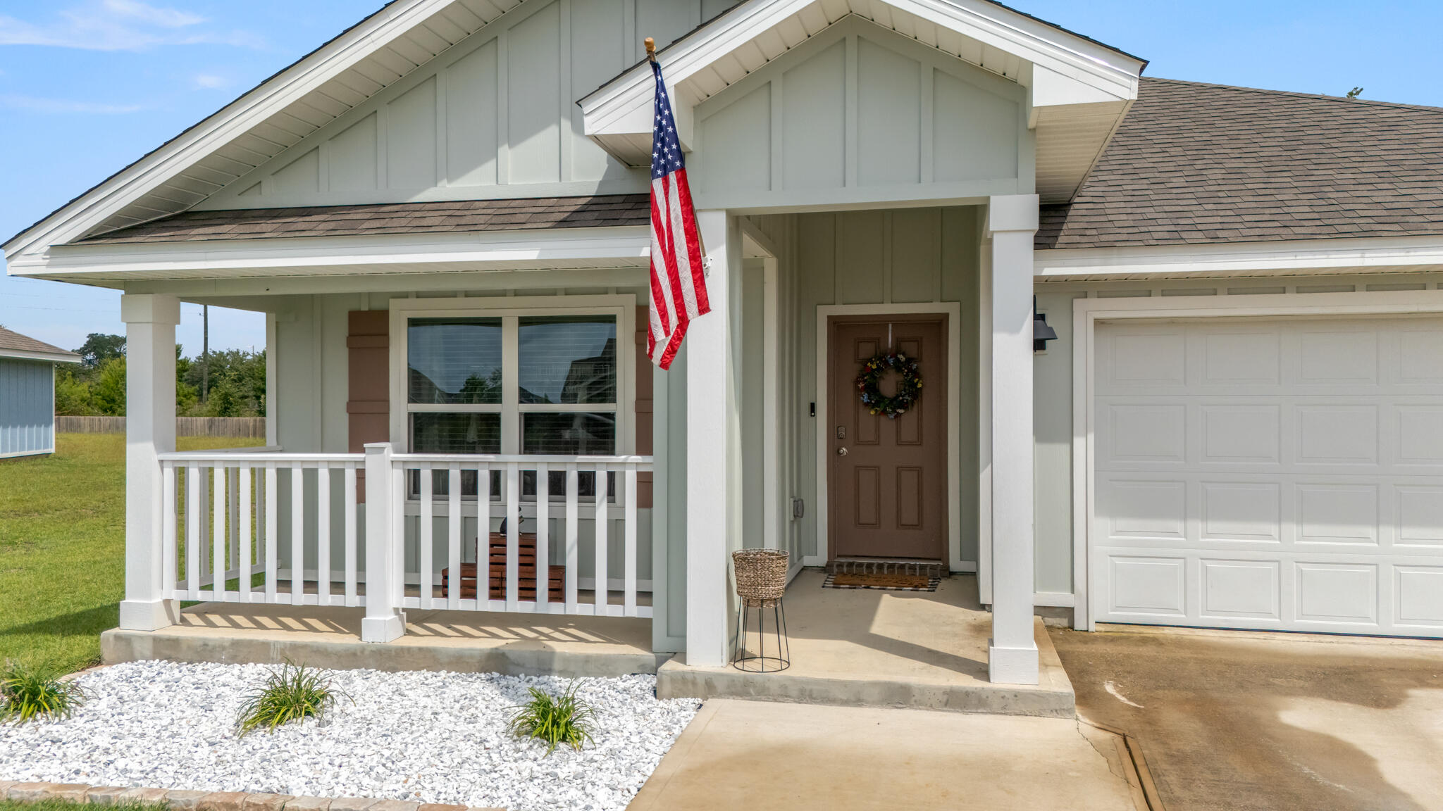 810 Otto Loop Crestview, FL 32539 - Photo 3 of 41 a view of a house with a small yard and wooden floor and fence