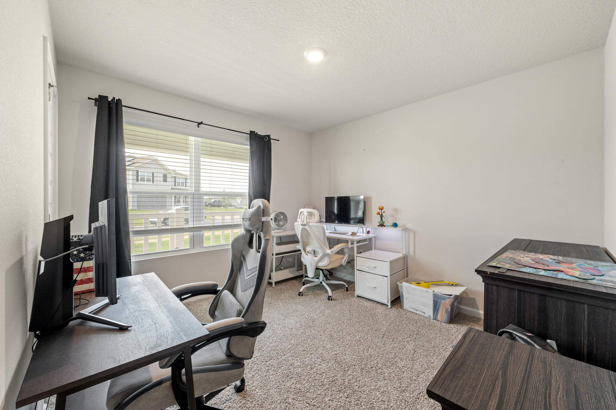 810 Otto Loop Crestview, FL 32539 - Photo 5 of 41 a view of a workspace with furniture and a window