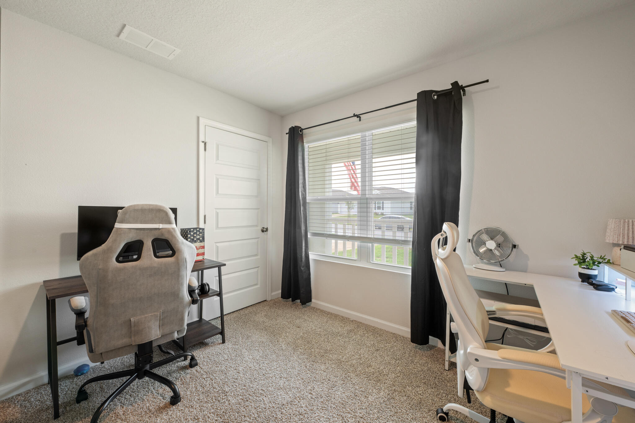 810 Otto Loop Crestview, FL 32539 - Photo 6 of 41 a view of a workspace with furniture and a window