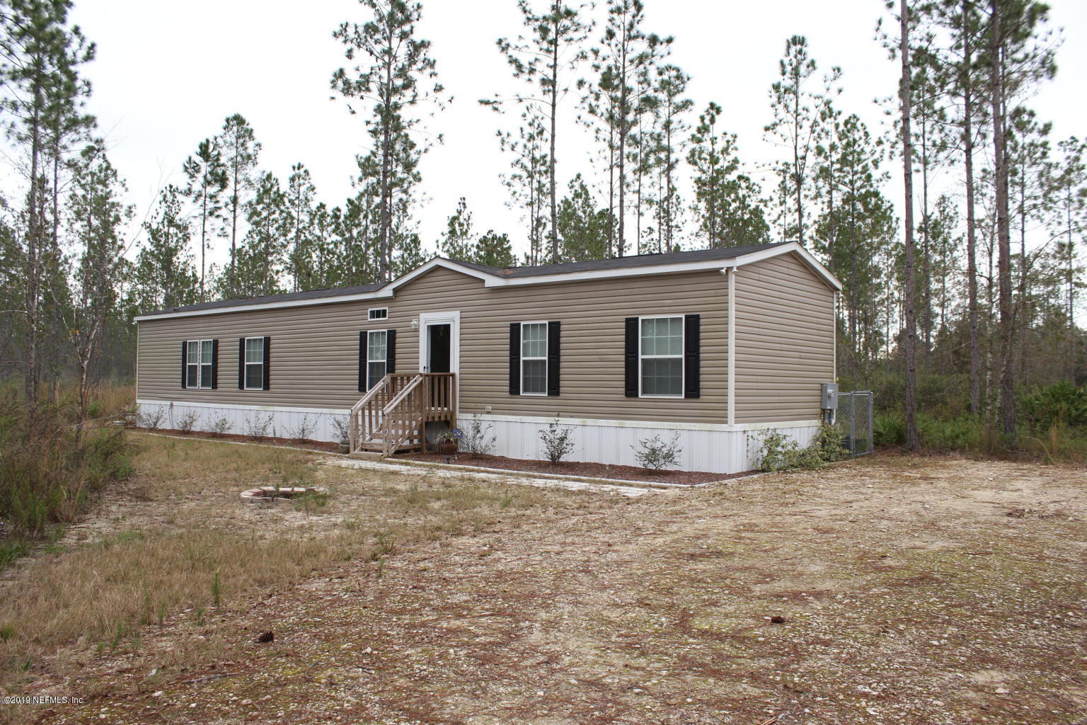 15686 Forest Trail Road Jacksonville, FL 32234 - Photo 2 of 20 FRONT OF HOME