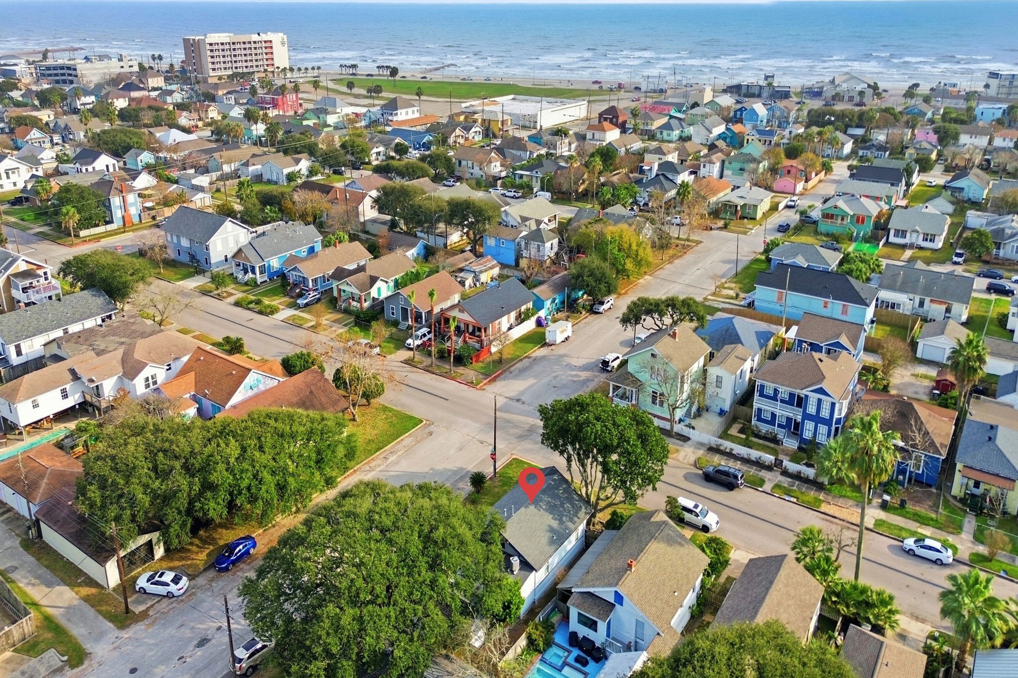 an aerial view of residential houses with outdoor space