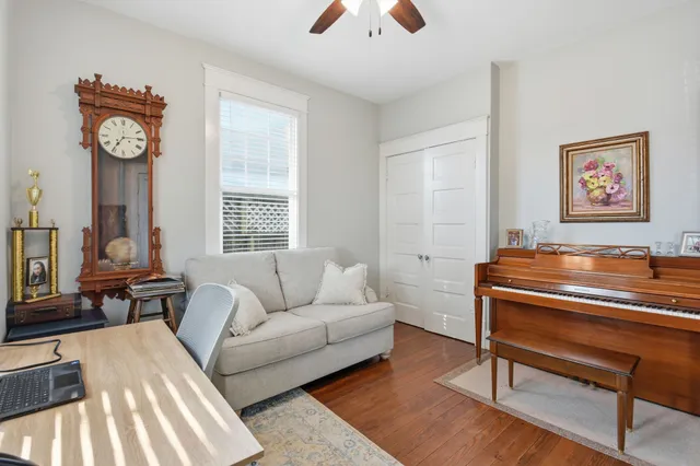 a living room with furniture and a window
