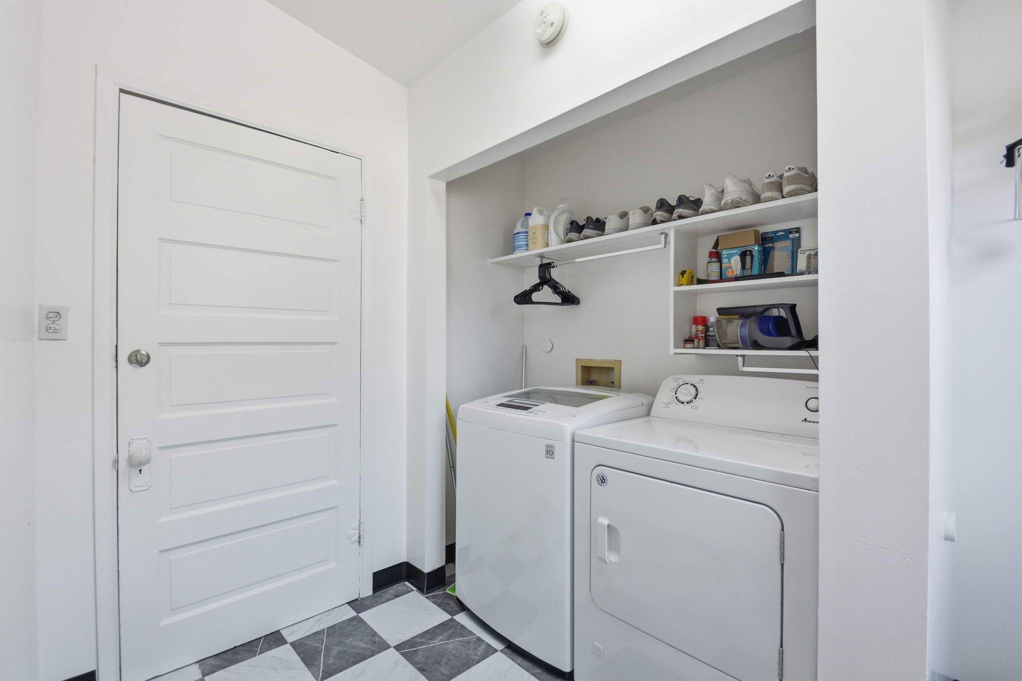 3602 Avenue R Galveston, TX 77550 - Photo 21 of 25 a view of storage and utility room with washer and dryer