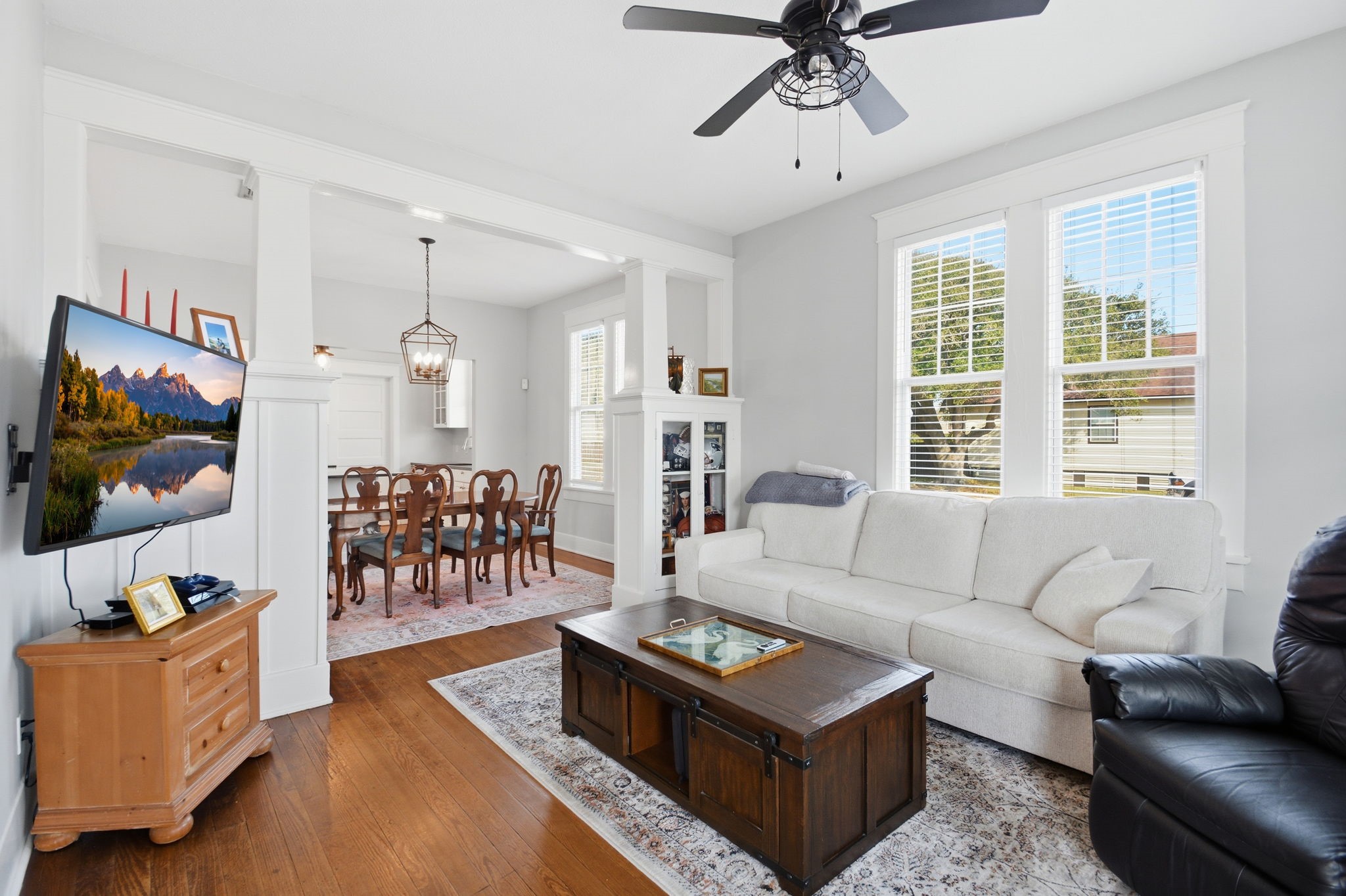3602 Avenue R Galveston, TX 77550 - Photo 3 of 25 a living room with furniture and a flat screen tv