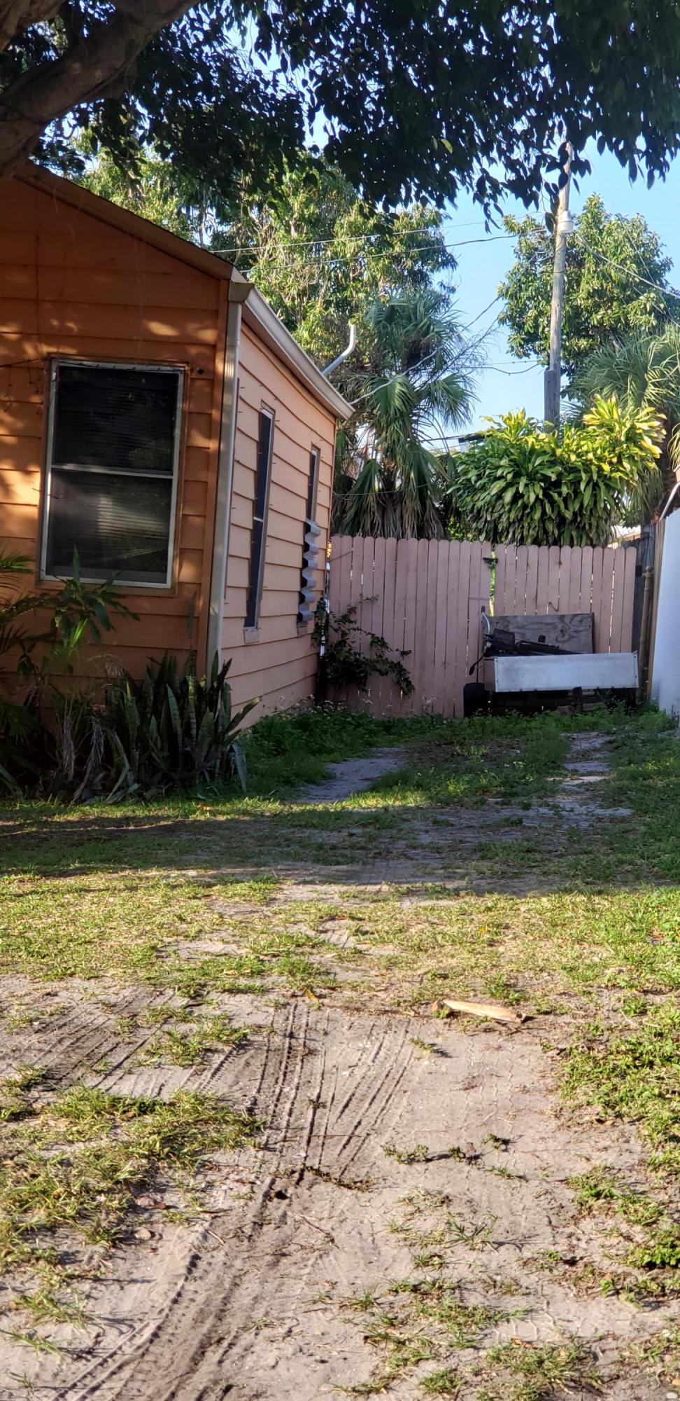 807 Hampton Road West Palm Beach, FL 33405 - Photo 3 of 21 Right side of the house