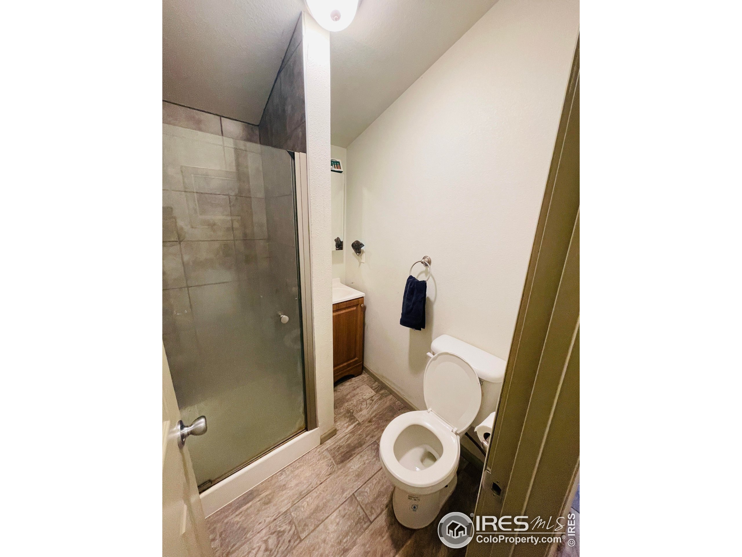 470 West Spring Street Nederland, CO 80466 - Photo 12 of 19 a bathroom with a sink and a toilet