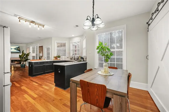 a view of a hallway with windows