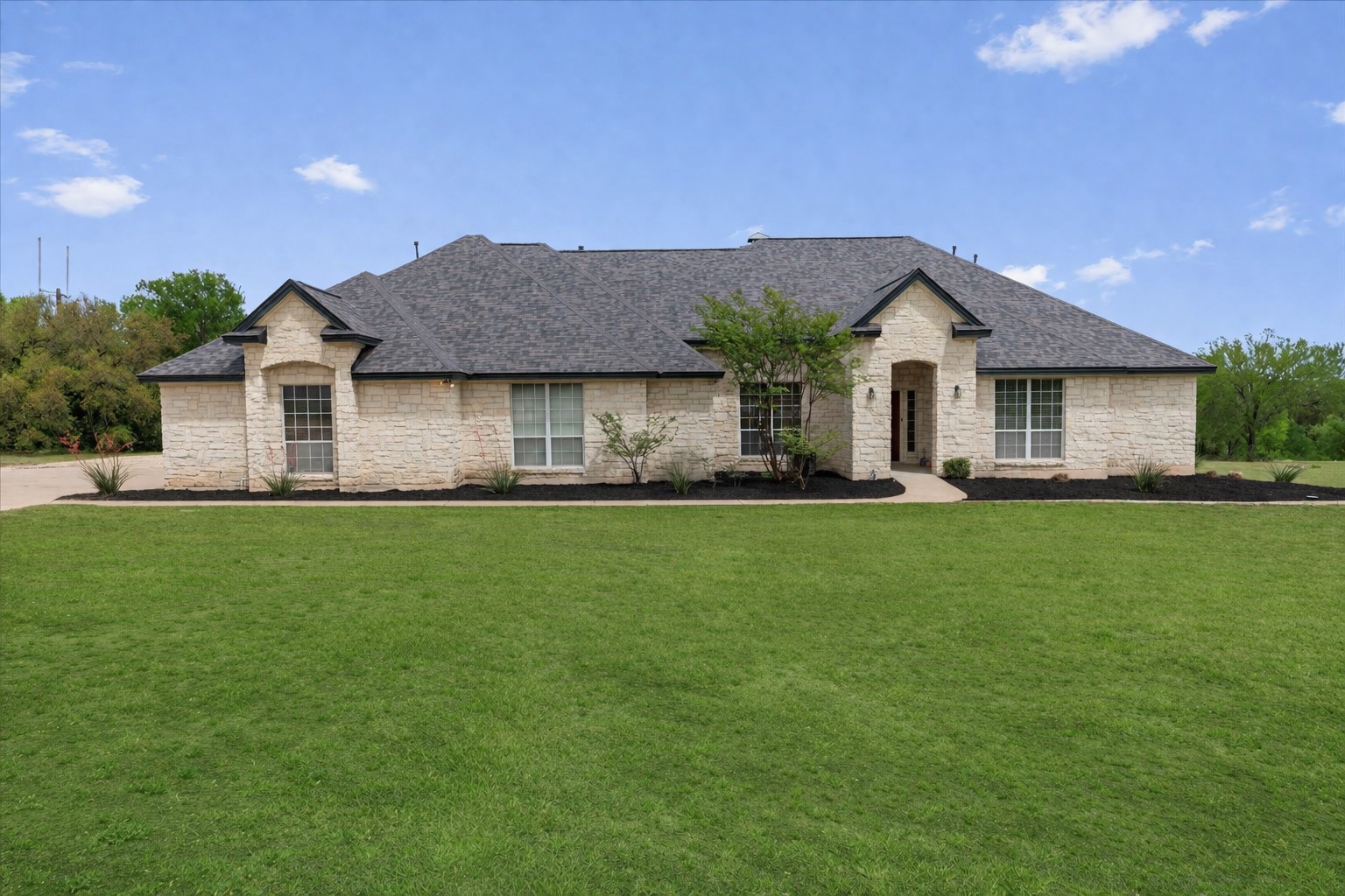144 D B Wood Road Georgetown, TX 78628 - Photo 1 of 1 Grass color is virtually enhanced