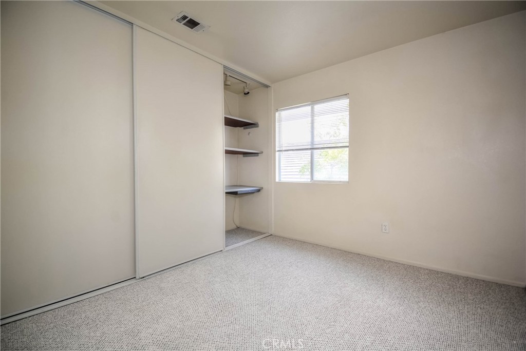 554 Pointe Vista Court Corona, CA 92881 - Photo 22 of 31 an empty room with windows