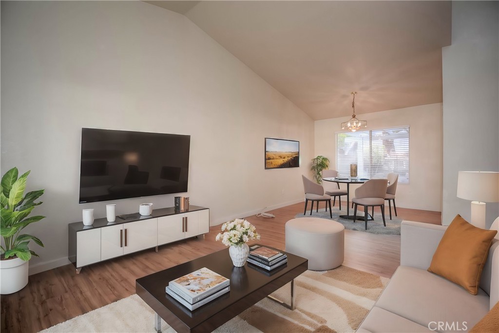 554 Pointe Vista Court Corona, CA 92881 - Photo 4 of 31 a living room with furniture and a flat screen tv