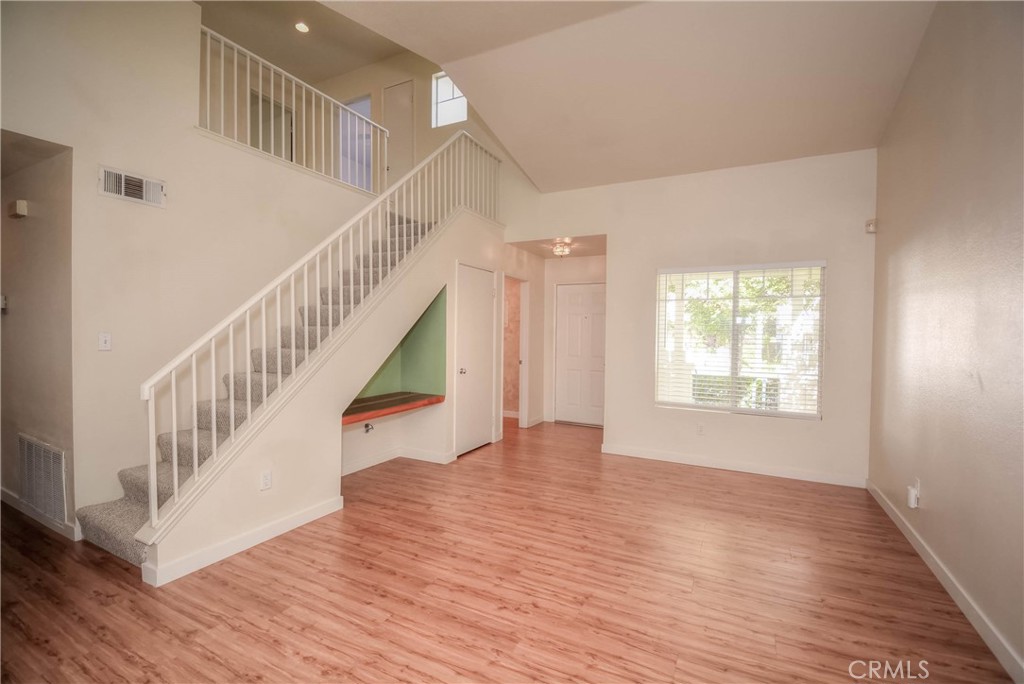 554 Pointe Vista Court Corona, CA 92881 - Photo 7 of 31 a view of entryway and hall with wooden floor