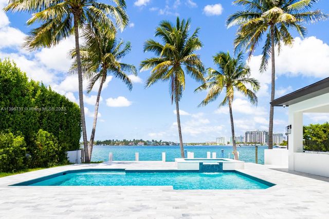 a view of a garden with a palm tree