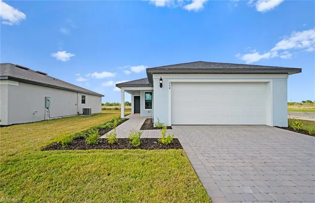 $299,990 | 254 Silent Lk Drive, Lehigh Acres, FL 33974
