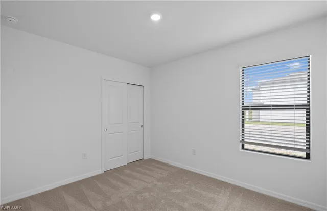 $299,990 | 254 Silent Lk Drive, Lehigh Acres, FL 33974