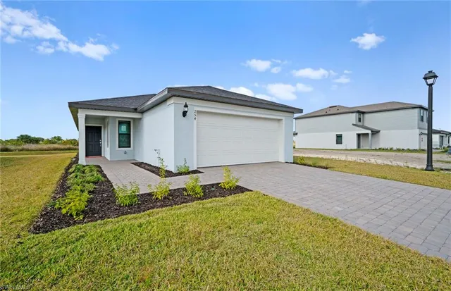 $299,990 | 254 Silent Lk Drive, Lehigh Acres, FL 33974