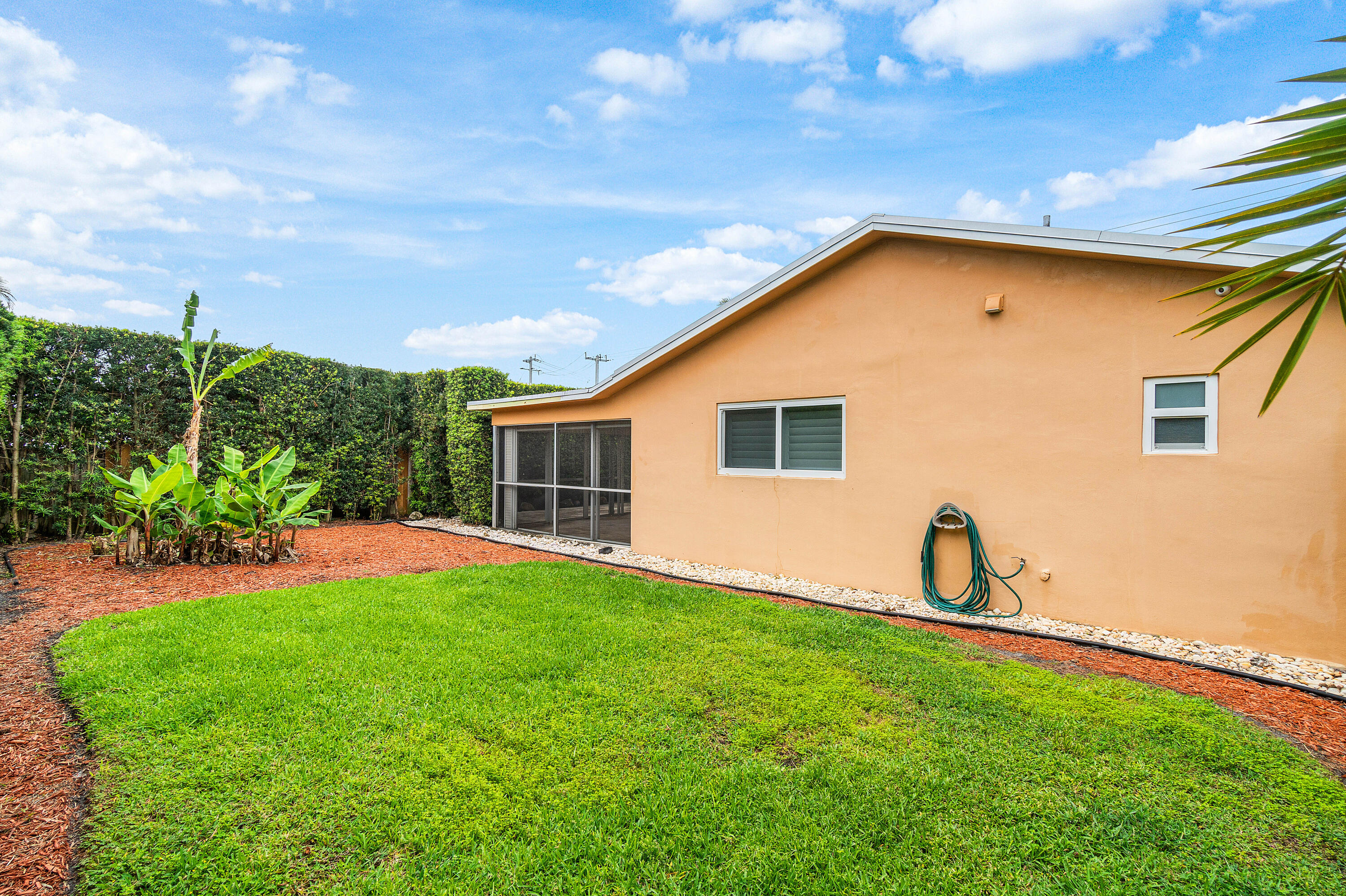 400 Northeast 43rd Street Boca Raton, FL 33431 - Photo 35 of 36 Exterior Side Yard- East