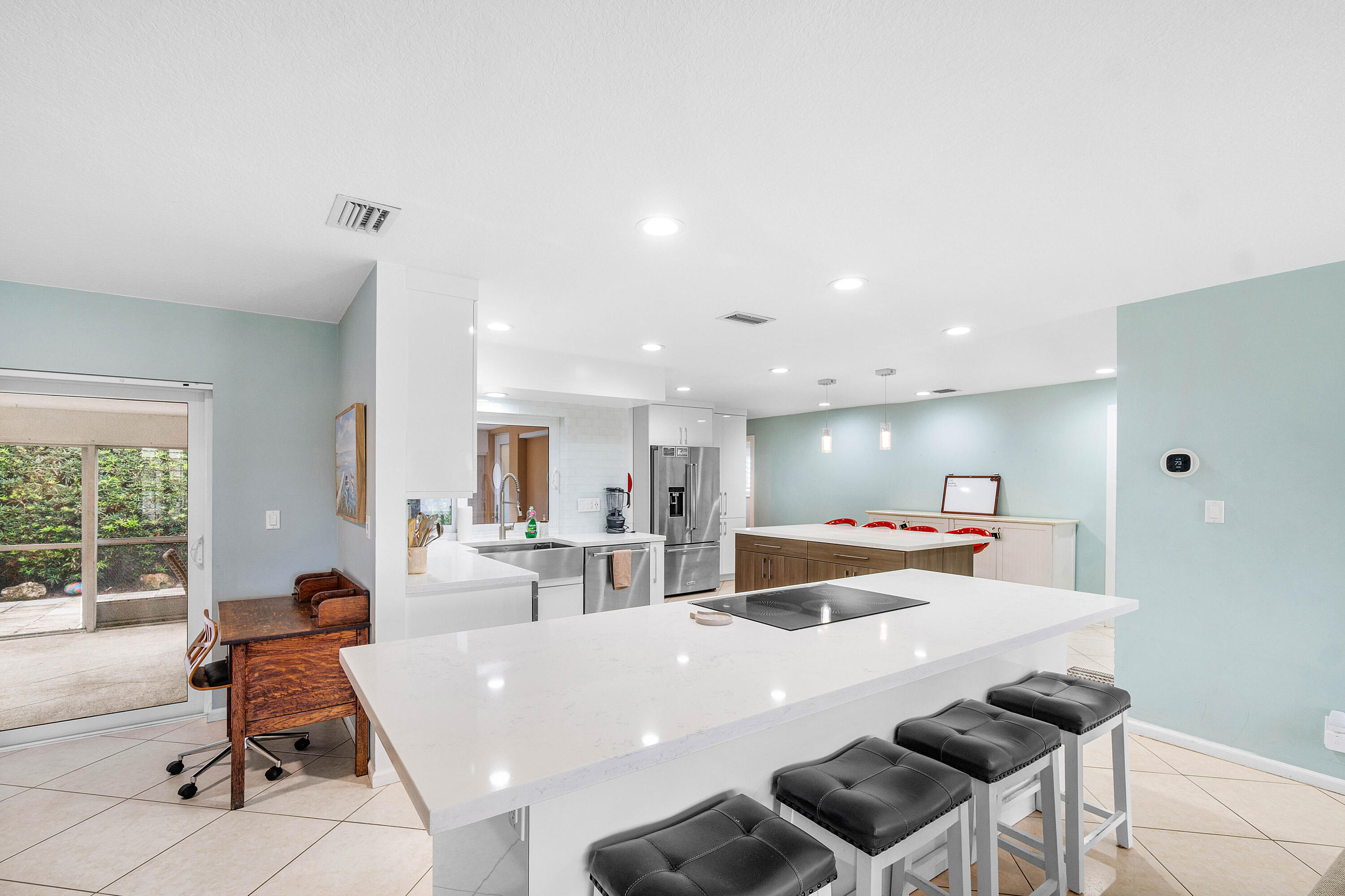 400 Northeast 43rd Street Boca Raton, FL 33431 - Photo 10 of 36 Kitchen Island into