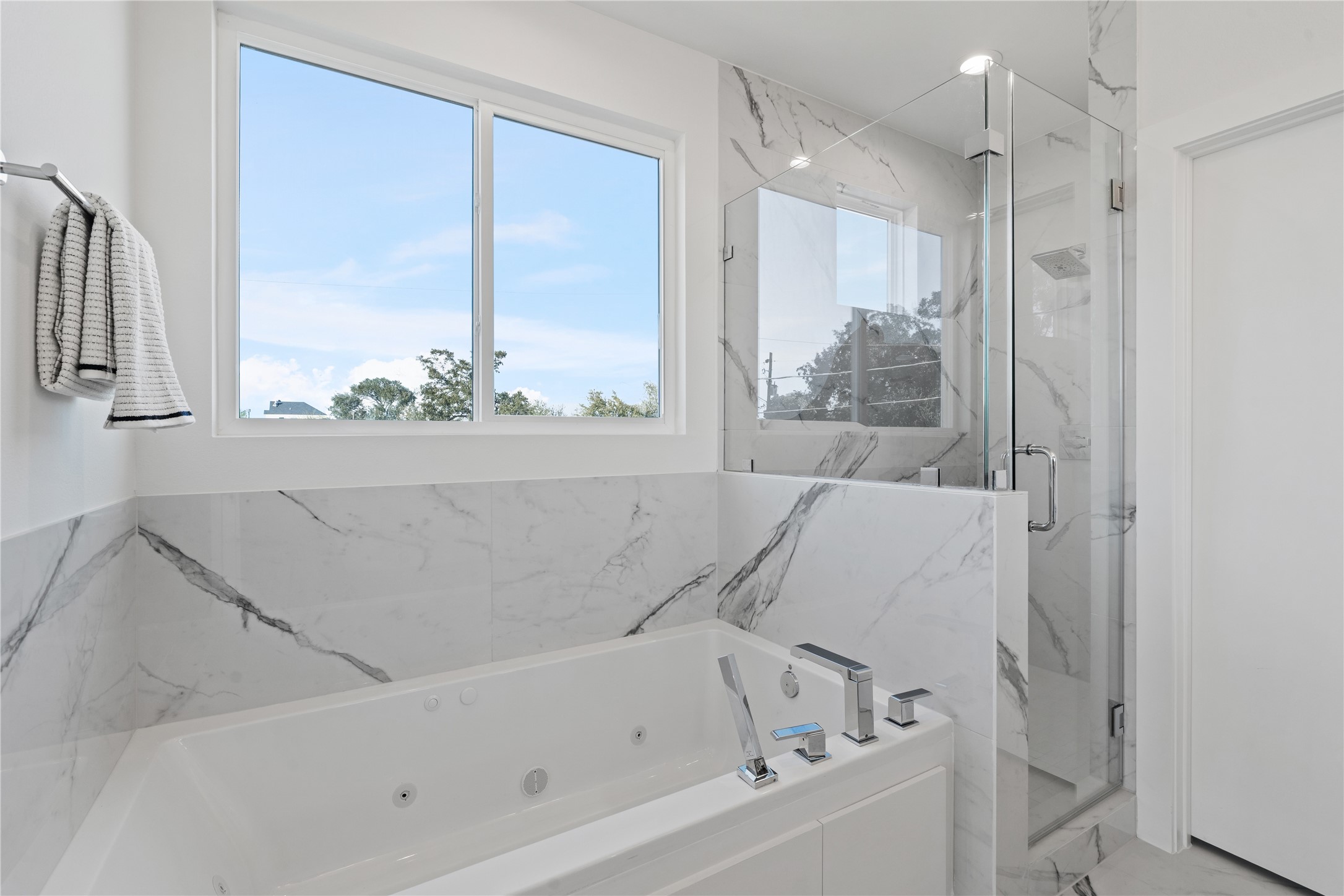 5404 Mulvey Street Houston, TX 77020 - Photo 20 of 28 a bathroom with a bathtub and a shower