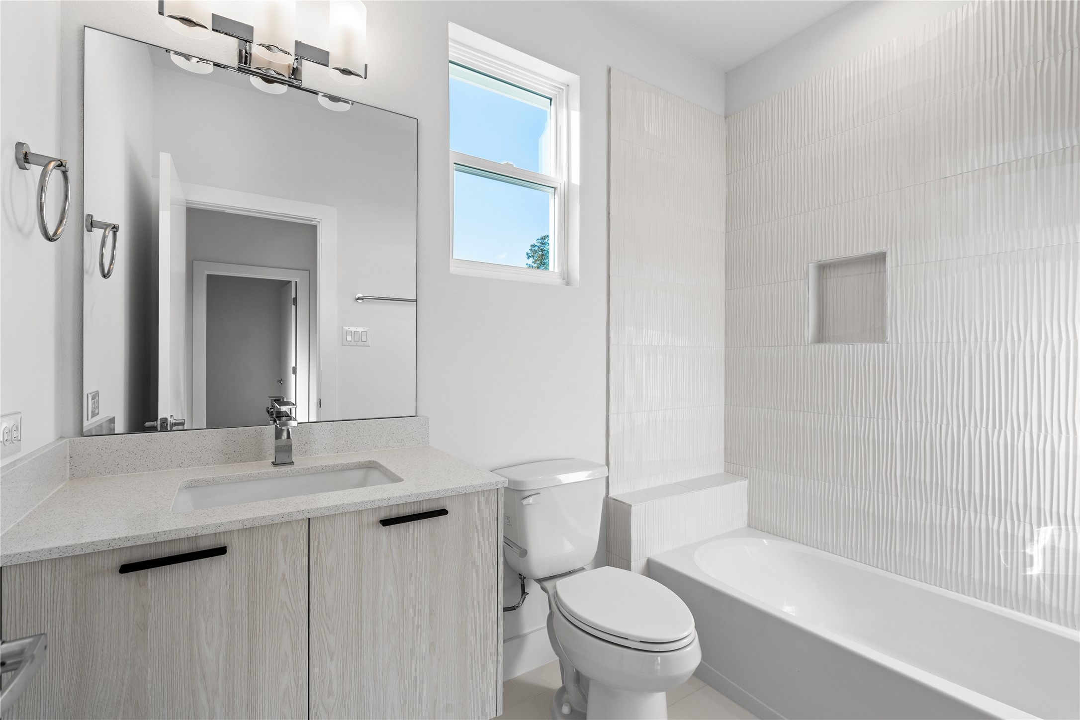 5404 Mulvey Street Houston, TX 77020 - Photo 23 of 28 a bathroom with a sink a toilet and shower