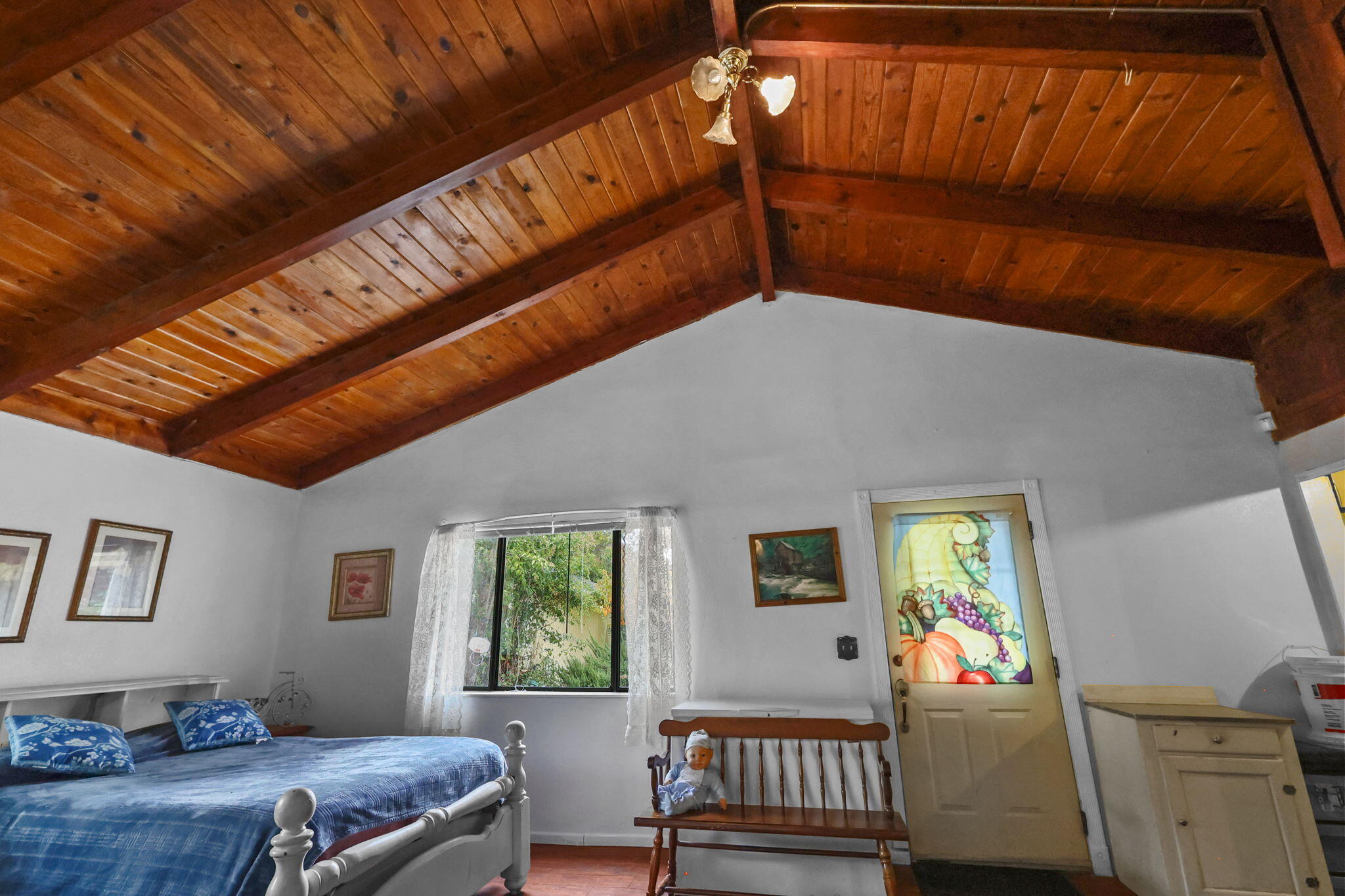 18385 Bowman Road Cottonwood, CA 96022 - Photo 11 of 39 a bedroom with furniture and a window