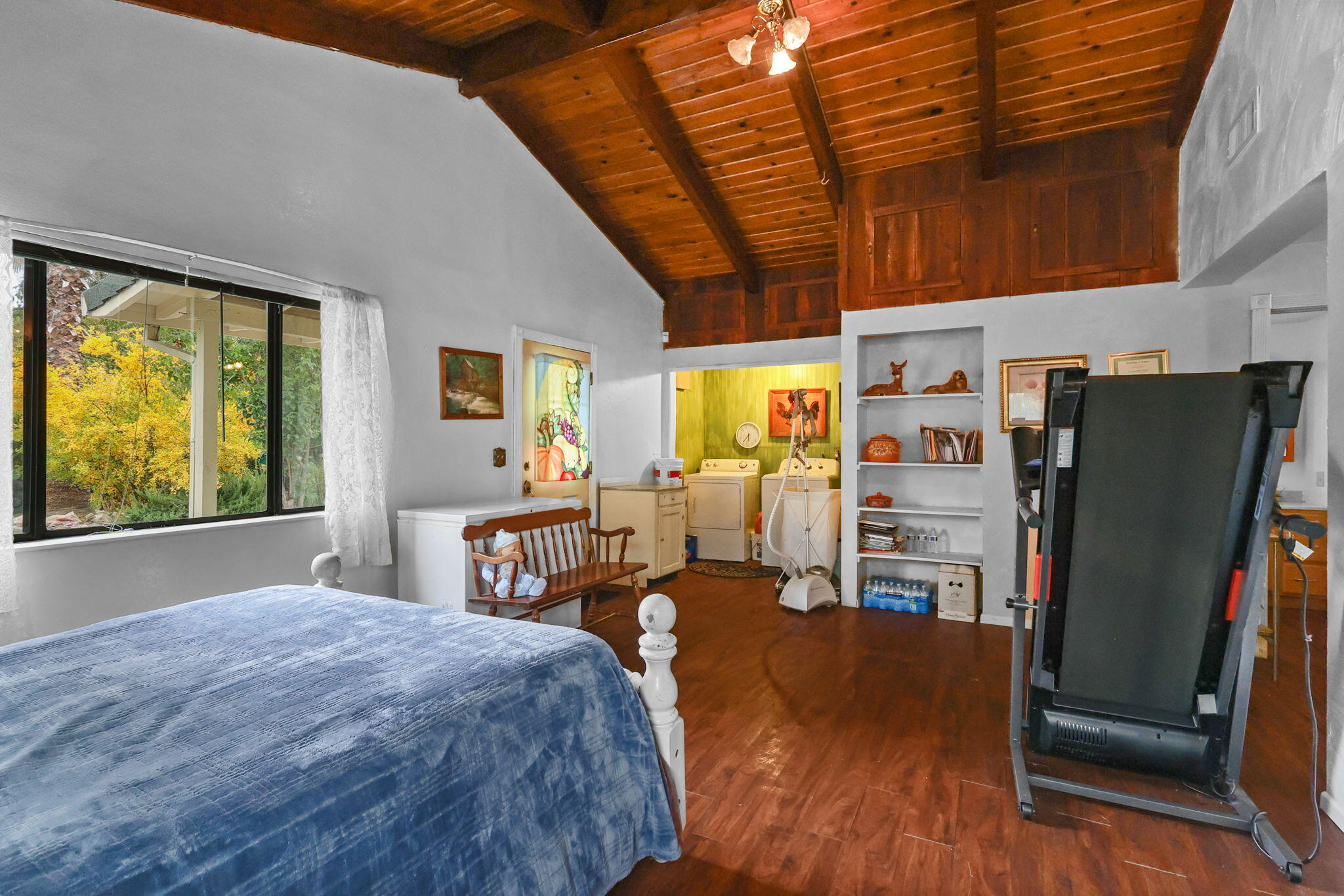 18385 Bowman Road Cottonwood, CA 96022 - Photo 12 of 39 a bed room with a bed window and a chair