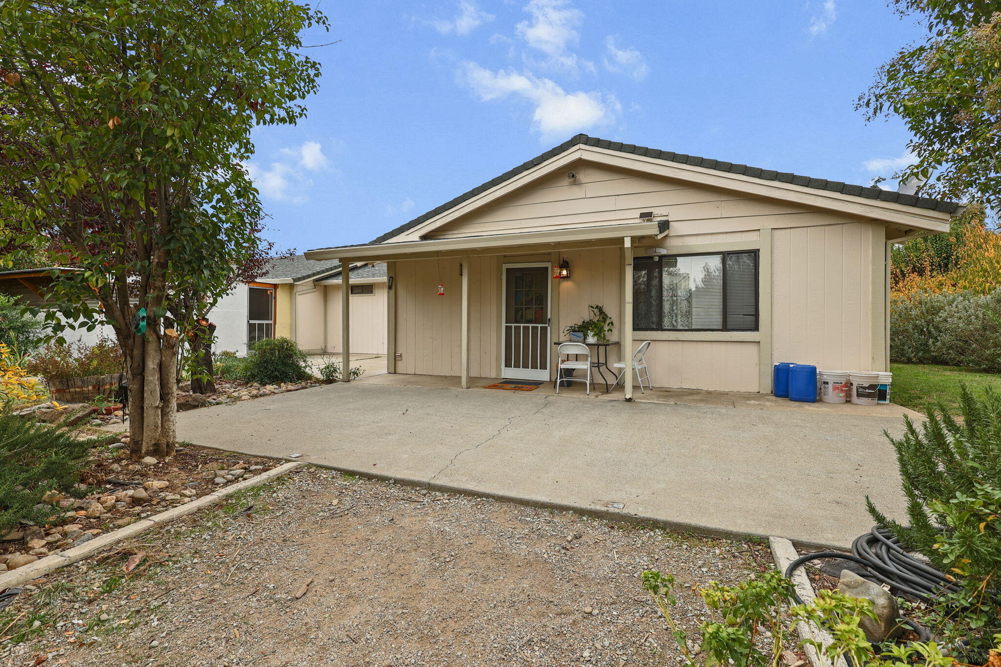 18385 Bowman Road Cottonwood, CA 96022 - Photo 31 of 39 a view of a house with backyard