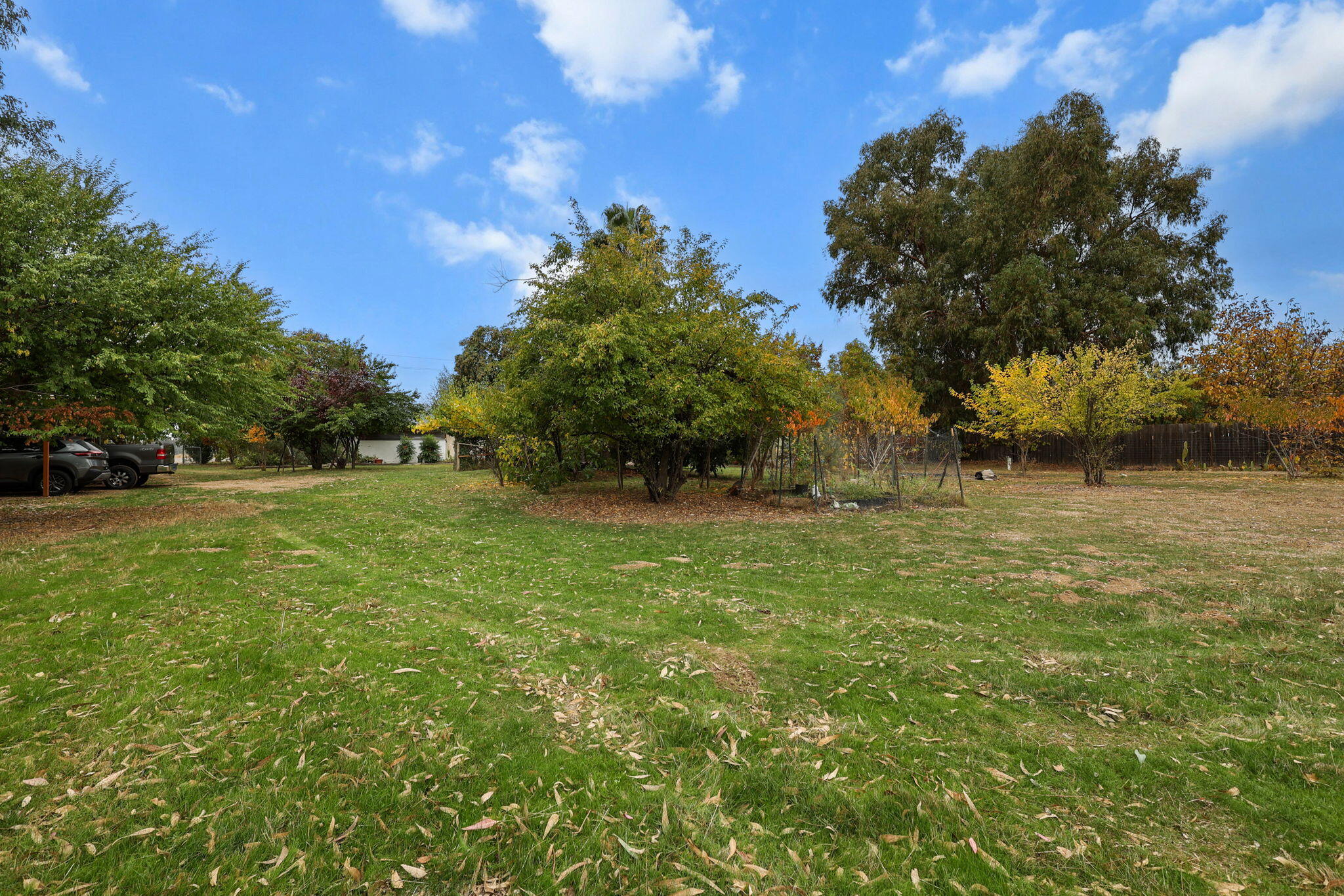 18385 Bowman Road Cottonwood, CA 96022 - Photo 35 of 39 a backyard of a house with lots of green space
