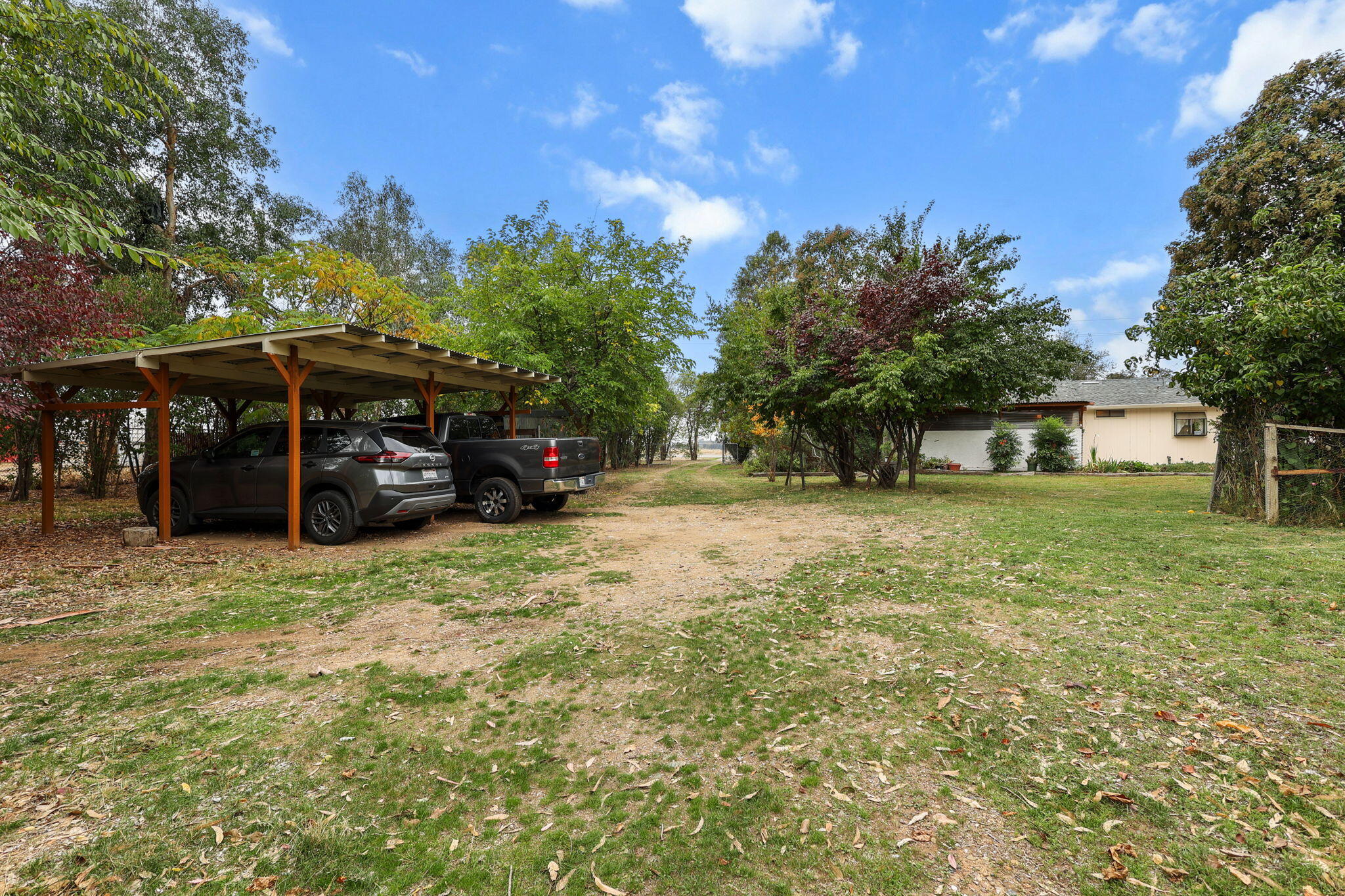 18385 Bowman Road Cottonwood, CA 96022 - Photo 36 of 39 a view of a house with a yard