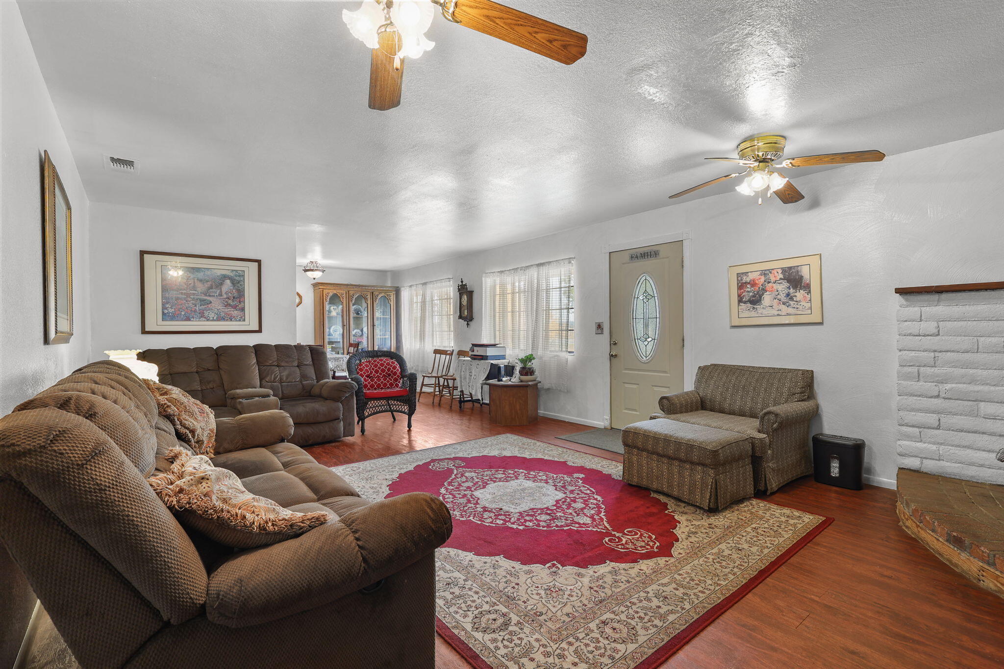 18385 Bowman Road Cottonwood, CA 96022 - Photo 7 of 39 a living room with furniture ceiling fan and a rug