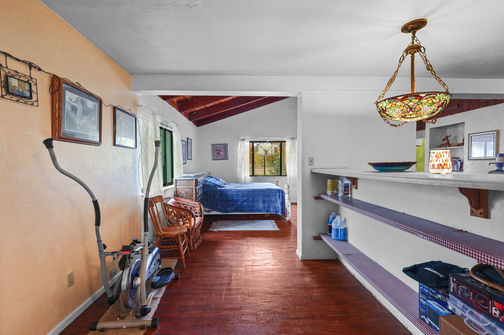 18385 Bowman Road Cottonwood, CA 96022 - Photo 9 of 39 a view of a livingroom with furniture and a chandelier