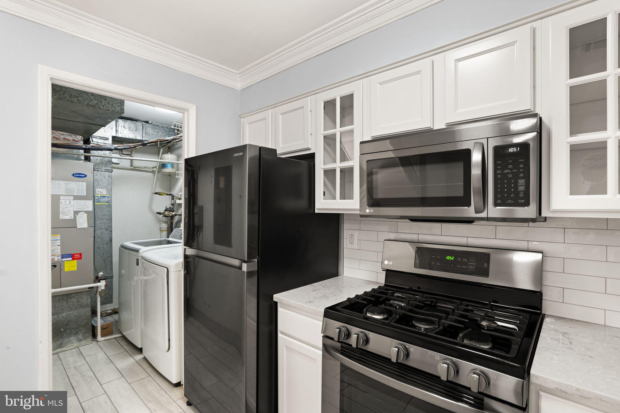 2266 Coppersmith Square Reston, VA 20191 - Photo 13 of 42 Kitchen/laundry view
