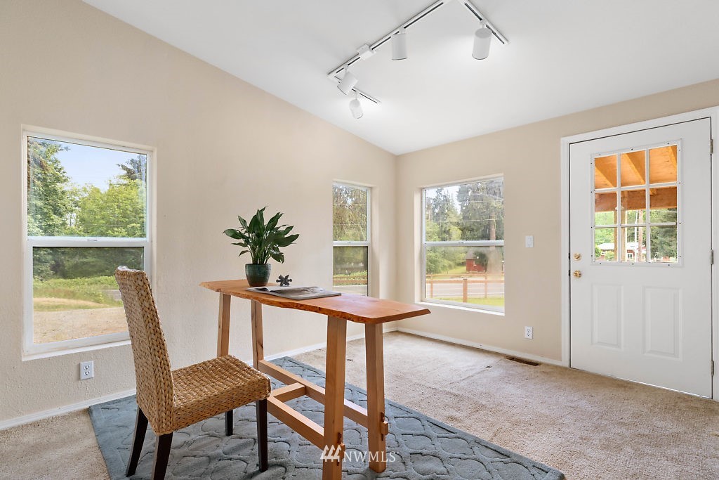 1815 Newman Road Freeland, WA 98249 - Photo 15 of 26 a dining room with furniture and window