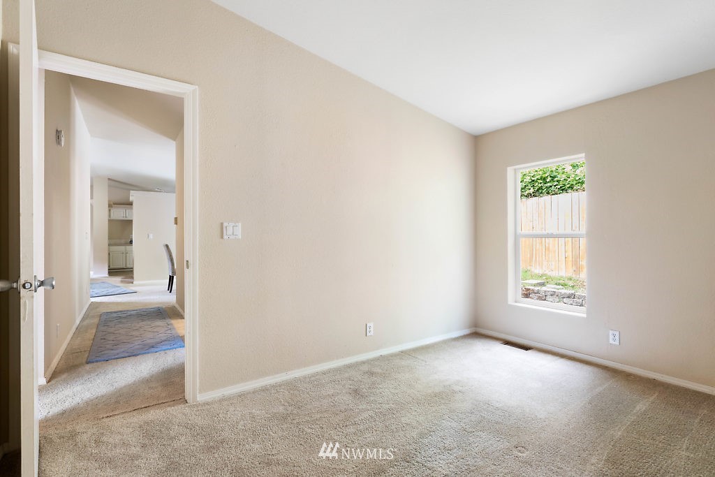 1815 Newman Road Freeland, WA 98249 - Photo 19 of 26 an empty room with windows and closet