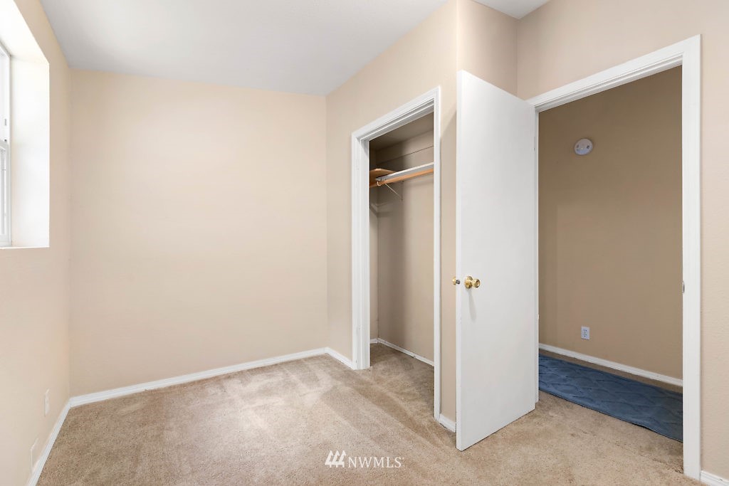 1815 Newman Road Freeland, WA 98249 - Photo 20 of 26 an empty room with closet and a window