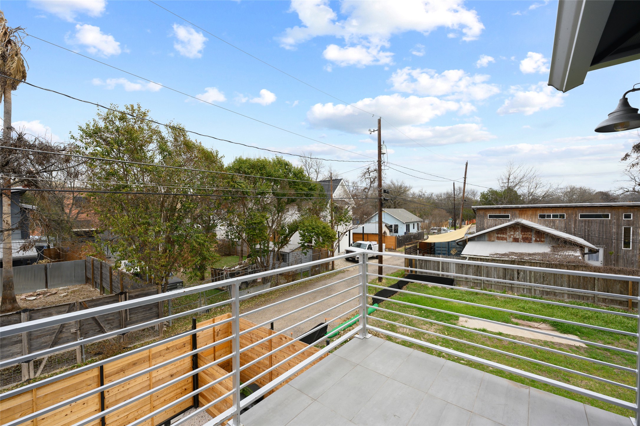 2102 East 2nd Street, Unit 2 Austin, TX 78702 - Photo 15 of 18 Seize the day with morning coffee or an evening beverage on your private balcony.