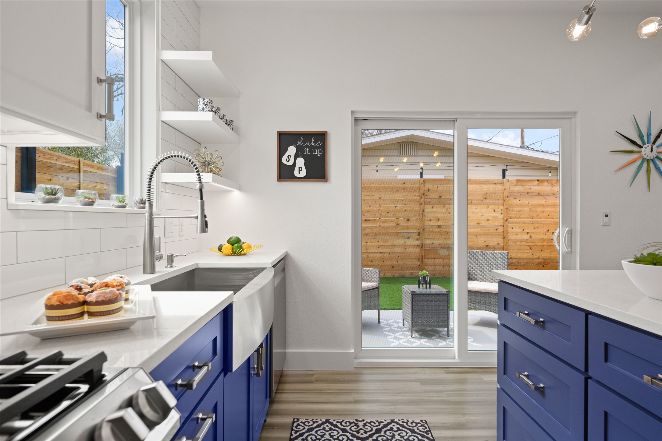 2102 East 2nd Street, Unit 2 Austin, TX 78702 - Photo 2 of 18 The large sliding glass doors off the kitchen create a perfect opportunity for indoor/outdoor dining.