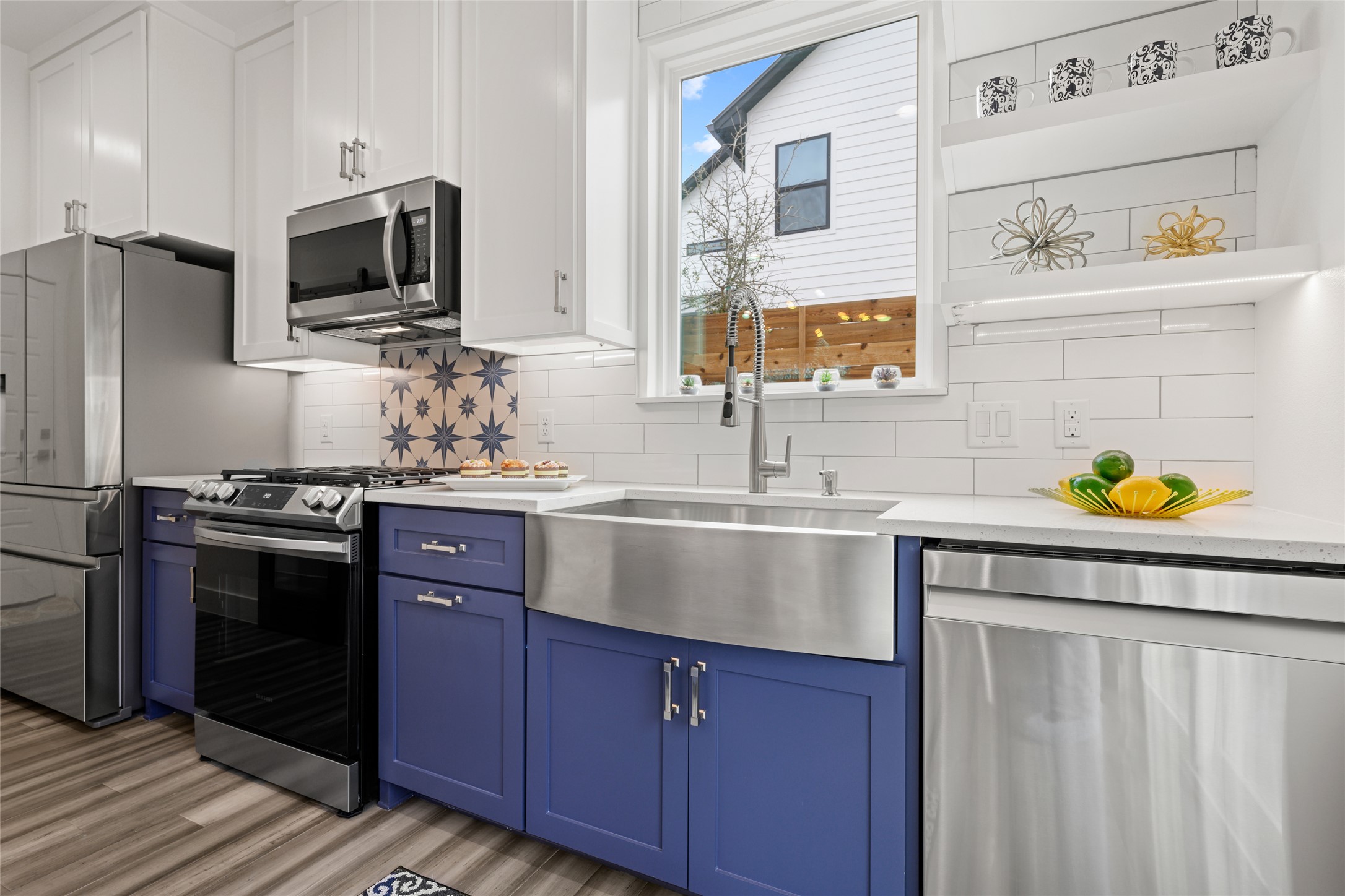 2102 East 2nd Street, Unit 2 Austin, TX 78702 - Photo 7 of 18 Enjoy a dedicated pantry, custom soft-close cabinets, and high-end stainless steel appliances. The refrigerator is included.