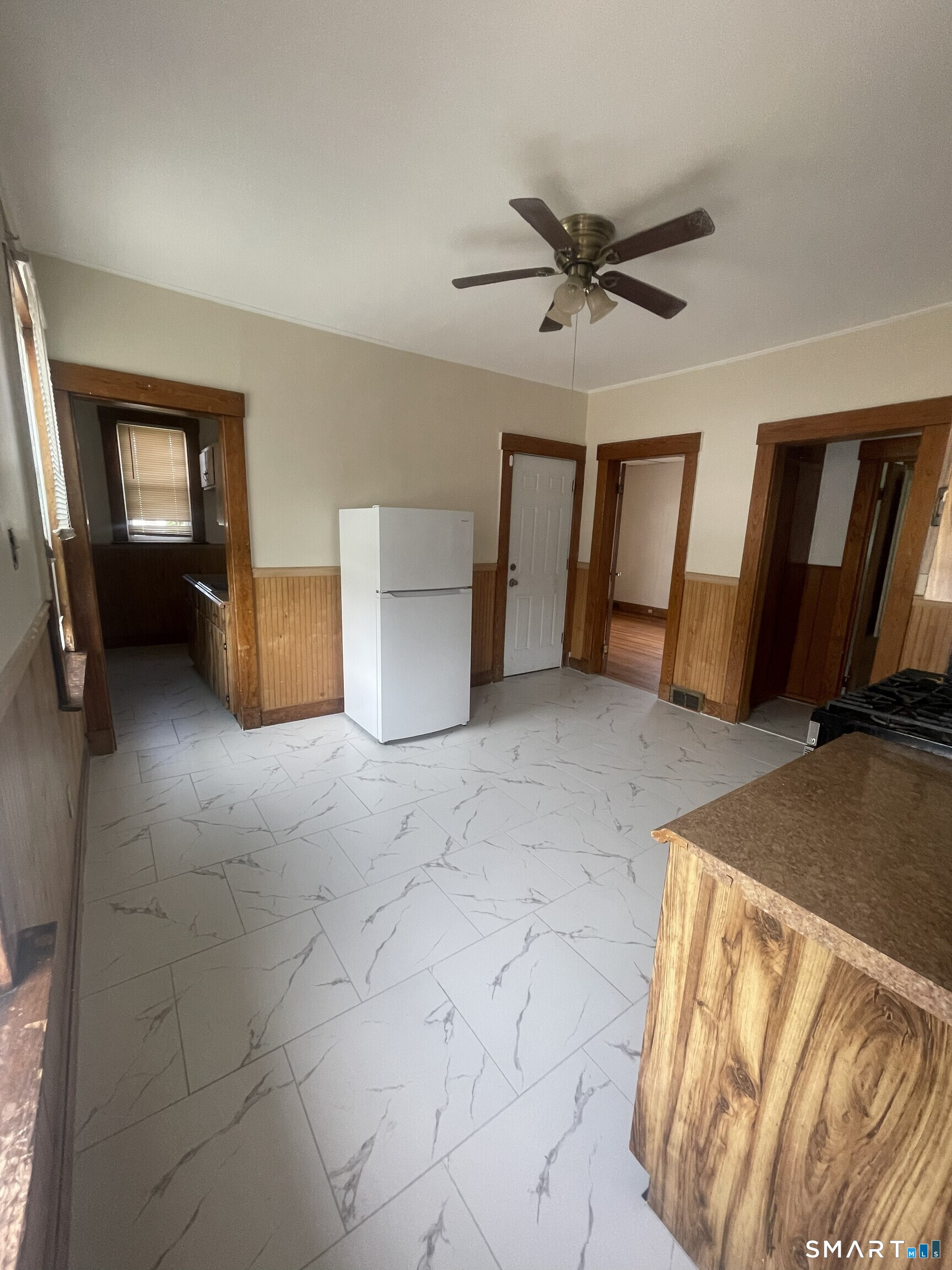 65 1st Street, Unit 2 Hamden, CT 06514 - Photo 4 of 15 a view of a livingroom with a staircase