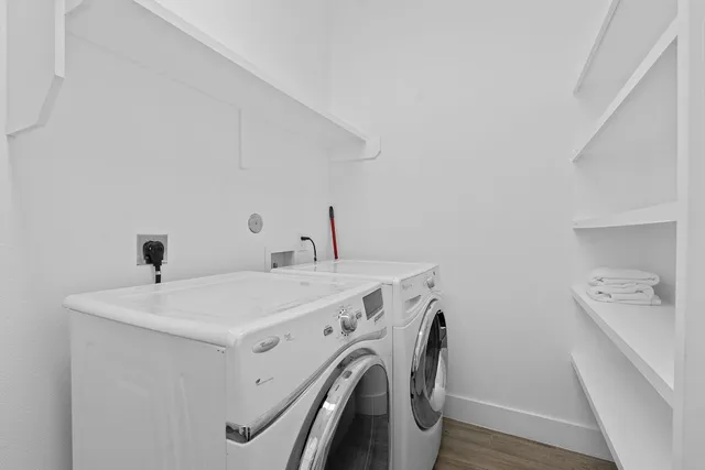 a utility room with dryer and washer