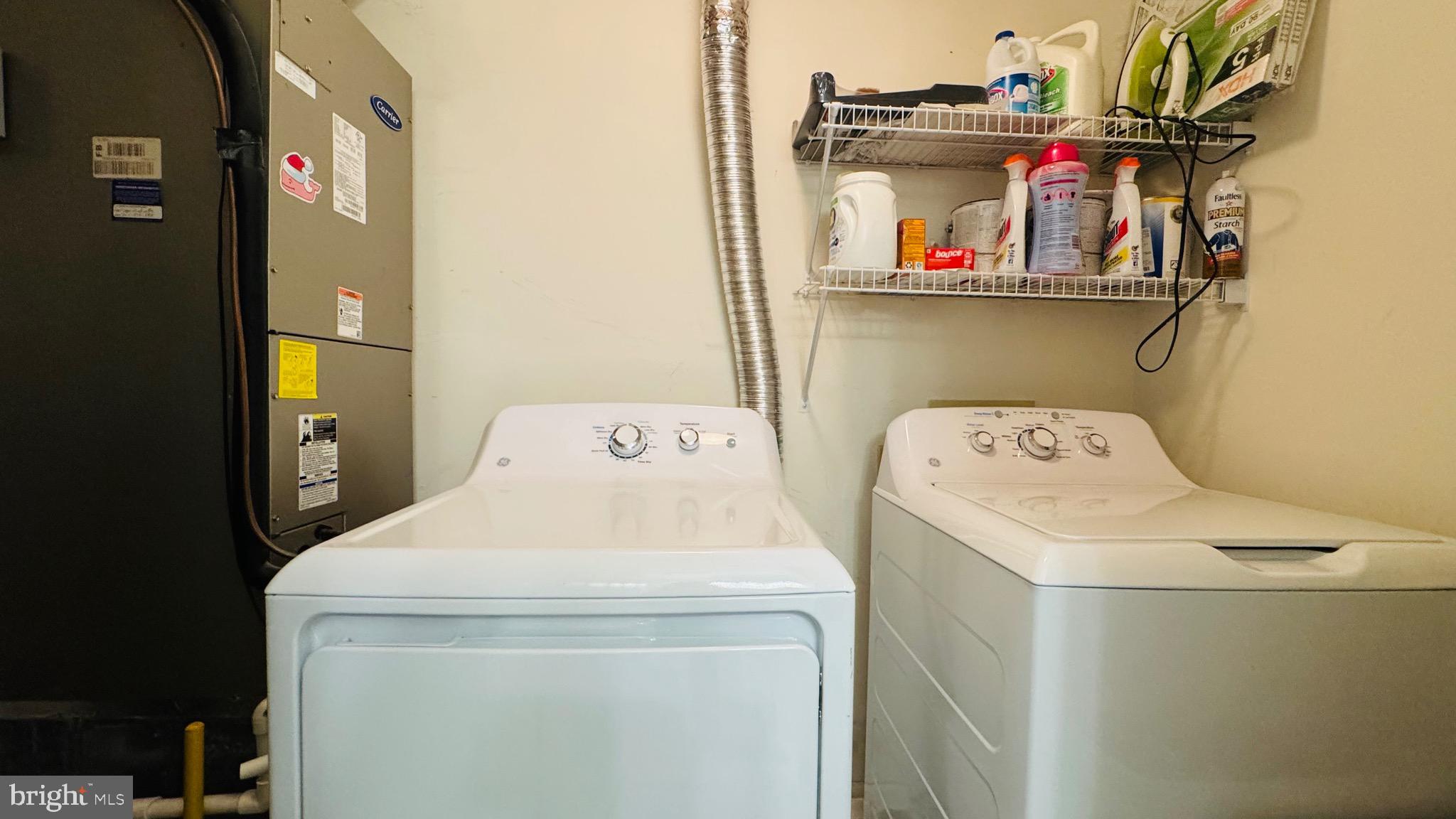 12012 Golf Ridge Court, Unit 374 Fairfax, VA 22033 - Photo 19 of 38 a utility room with dryer and washer
