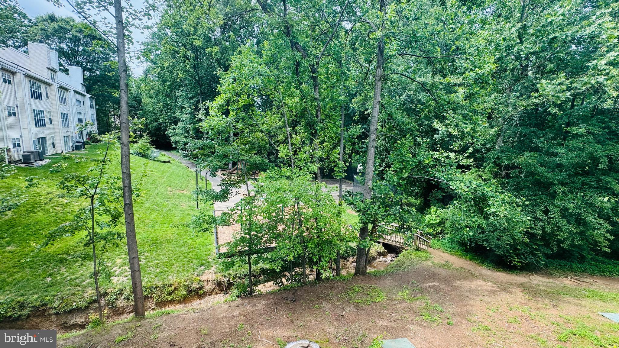 12012 Golf Ridge Court, Unit 374 Fairfax, VA 22033 - Photo 20 of 38 a view of a garden with plants