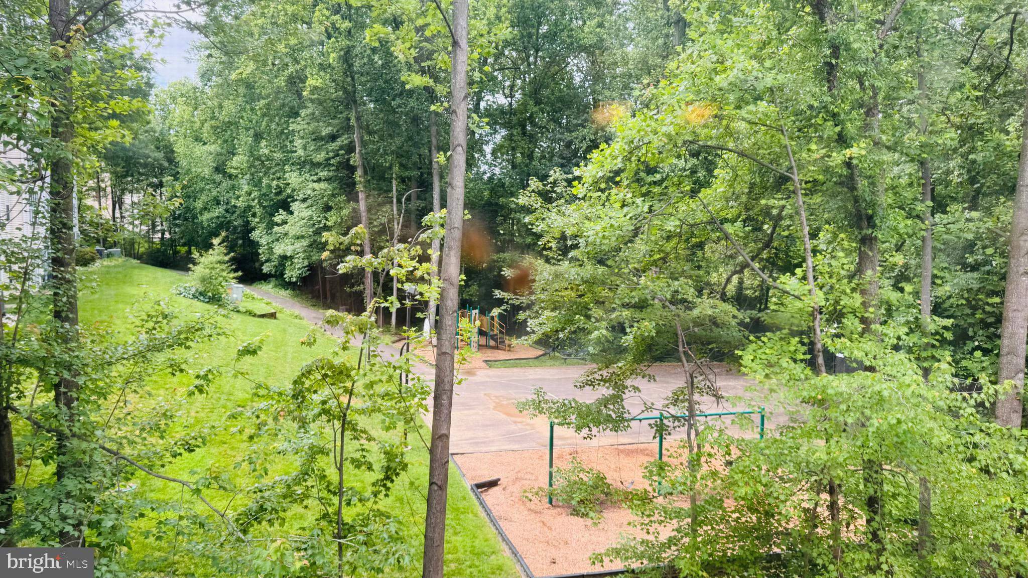 12012 Golf Ridge Court, Unit 374 Fairfax, VA 22033 - Photo 21 of 38 a view of yard from a balcony