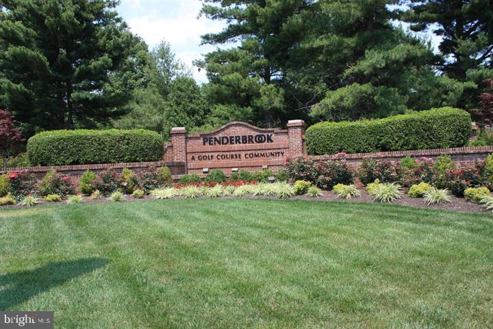12012 Golf Ridge Court, Unit 374 Fairfax, VA 22033 - Photo 22 of 38 a sign board with a garden
