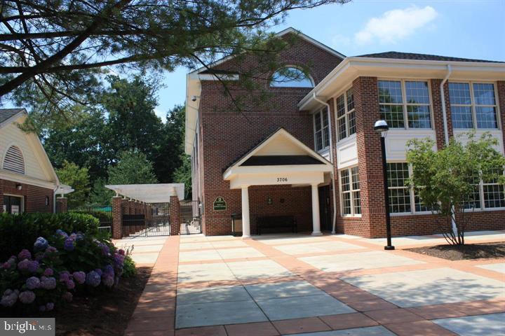 12012 Golf Ridge Court, Unit 374 Fairfax, VA 22033 - Photo 23 of 38 a view of a house with backyard and porch