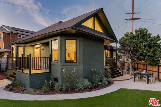 a view of a porch with a garden